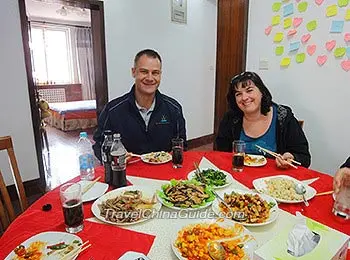 Our guests use chopsticks to eat.